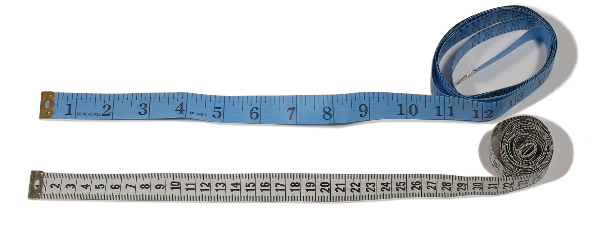 Фото 1. Измерительные ленты в сантиметрах и дюймах.